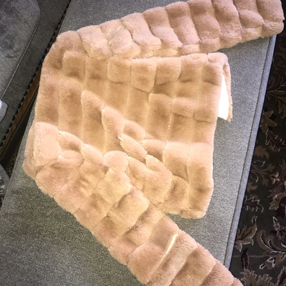 Small beige winter fur coat